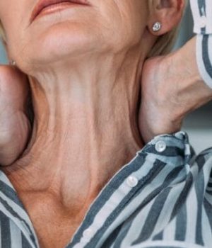 Older woman concerned about her neck or platysmal bands