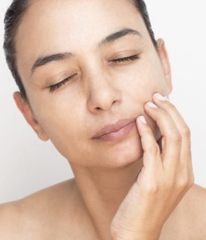 Young woman with dull skin concerns