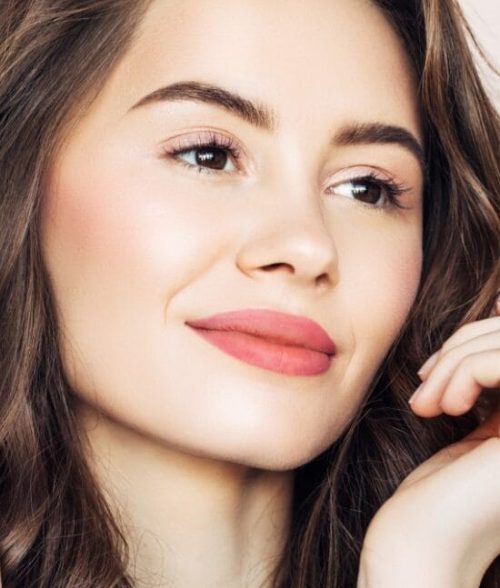 Studio shot of young beautiful woman